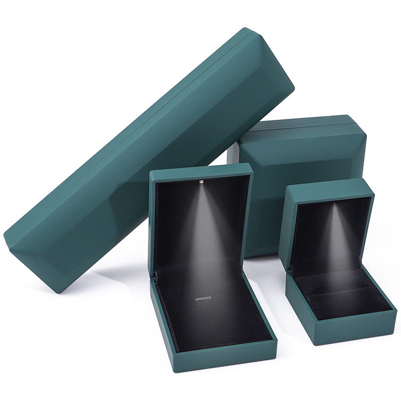 Paquete de joyas Logotipo personalizado Verde LED de luz caja de terciopelo para anillos Brazaletes Collares
