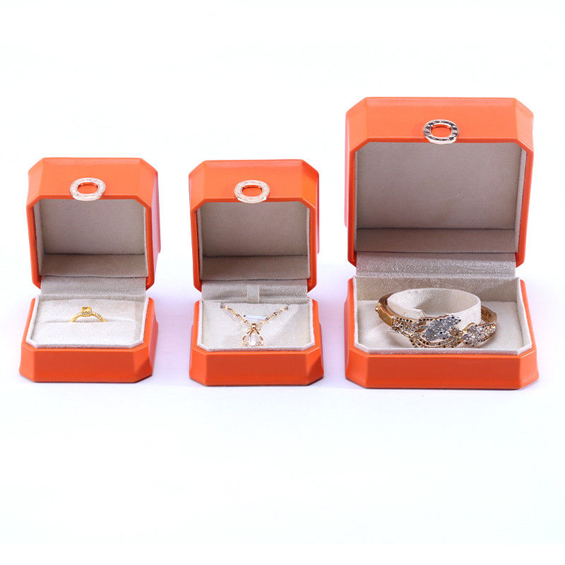 Caja de embalaje de joyas de cuero PU de color naranja cuadrado para brazalete de collar y anillo de bodas