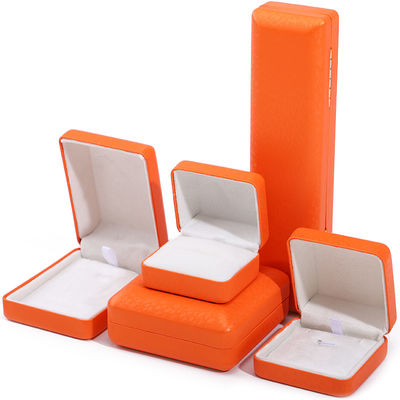 Logotipo personalizado Rectángulo naranja caja de joyería de cuero para lujo brazalete collar de almacenamiento