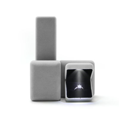 Caja de joyas de lujo con luz LED y logotipo Hanhong personalizado en material de terciopelo