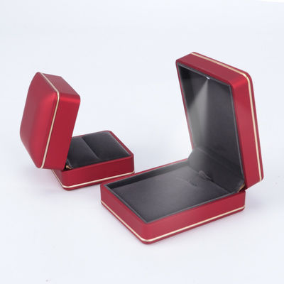 Cajas de joyería de terciopelo de plástico Material con luz y logotipo personalizado Impresión de pantalla de seda