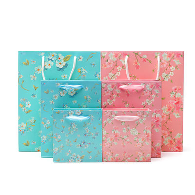 Patrón de flores bolso de papel de cartón robusto con asas para regalo de cumpleaños de la niña