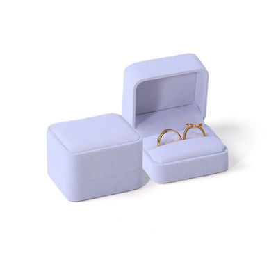 Caja de anillo doble única de joyería de terciopelo blanco personalizado de anillo de compromiso